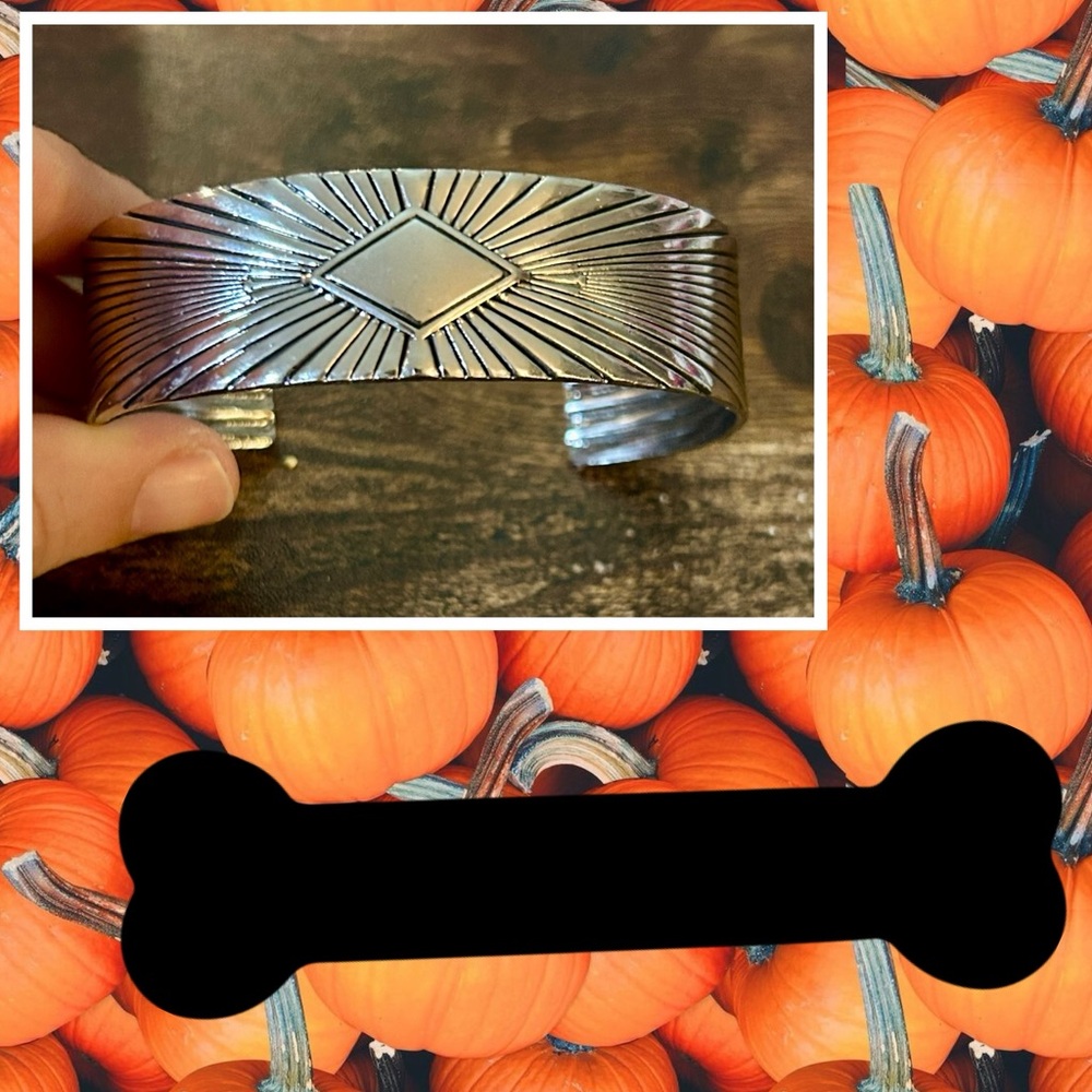 Silver tone cuff bracelet